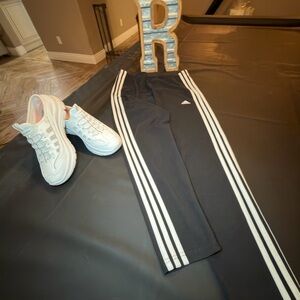 Adidas Women’s Black Joggers with White Stripes